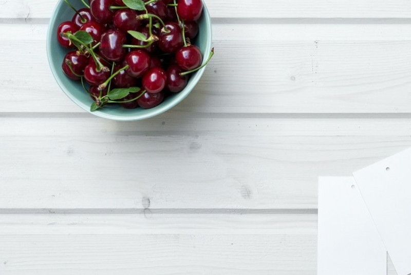 Cherries on a wooden table