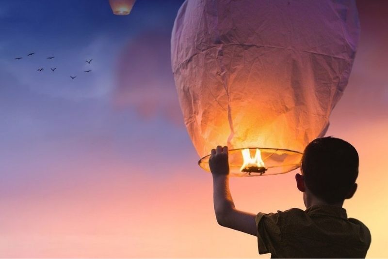 Man holding a balloon